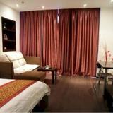 Dalian Parkland Ming Jie Hotel Style Apartment — фото 1